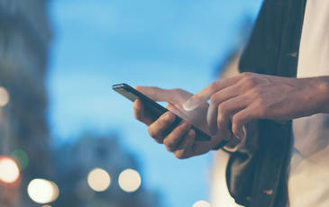 Hand holding phone