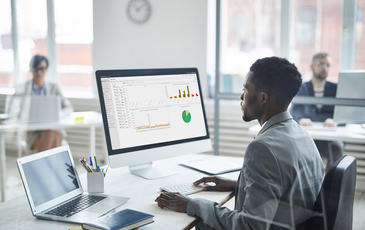 Man in office working with TEMS Cloud