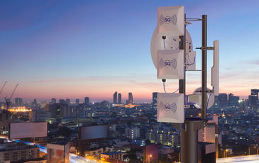 5G communication tower in big city