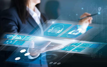 Woman looking at abstract graphic overlay reports