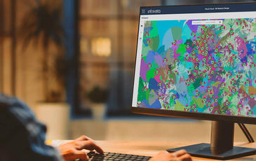 Man looking at screen with Planet Cloud software