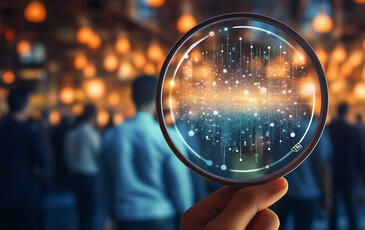 Close-up of magnifying glass, for focus on customer experience and seamless 5G monetization