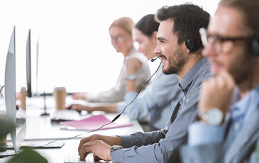 Team working at contact center representing Enterprise CX intelligence