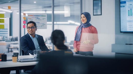 Team discussing in conference room