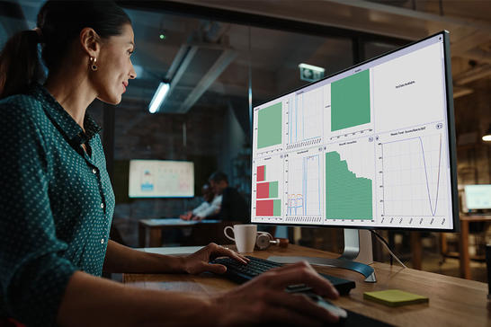 Woman in the office looking at her screen