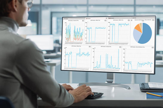 Man working in the office looking at monitor