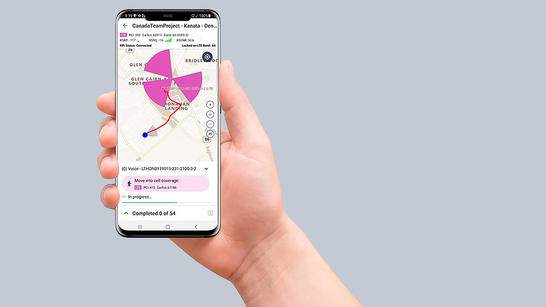 Hand holding TEMS SSV App