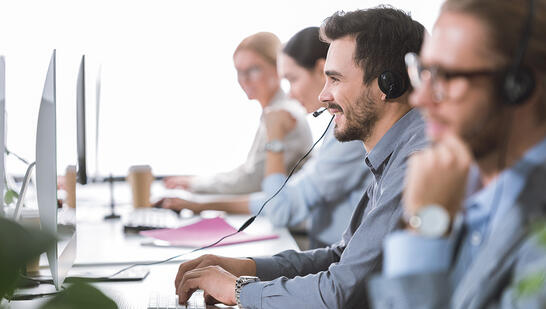 Team working at contact center representing Enterprise CX intelligence