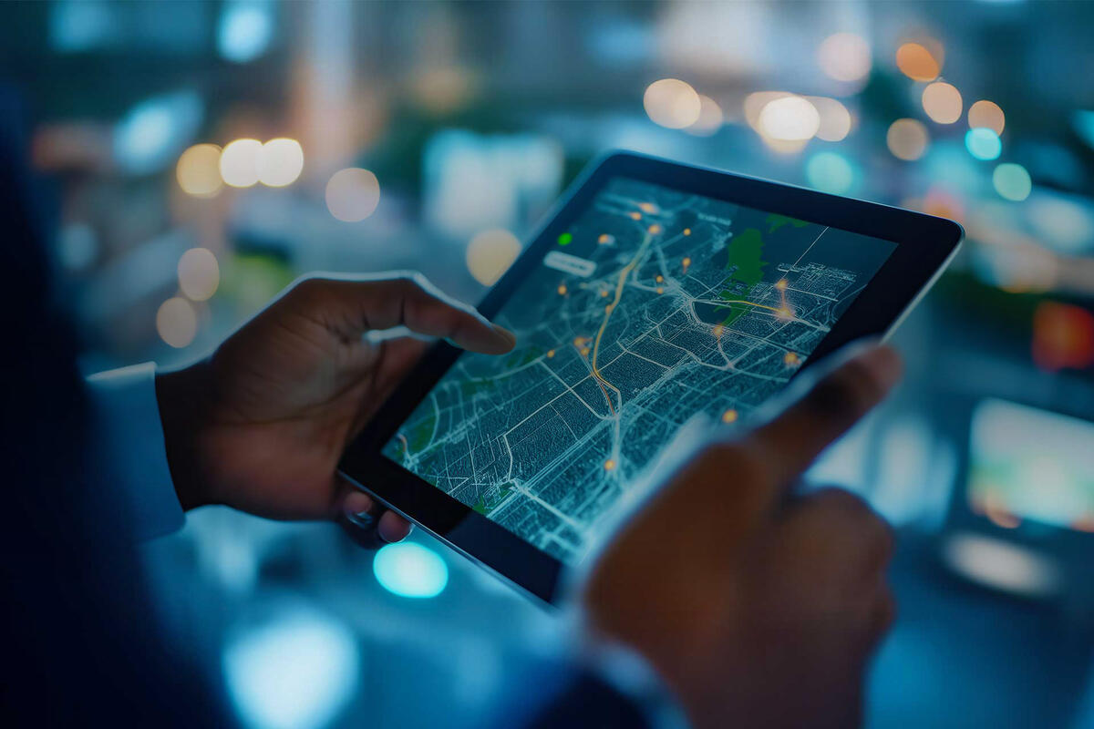 AI-powered network performance and automation concept illustrated by digital map on tablet.