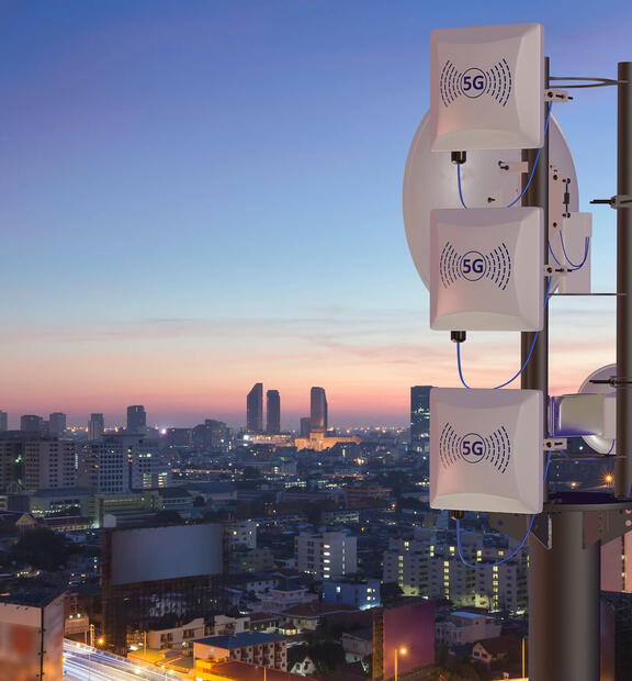 5G communication tower in big city