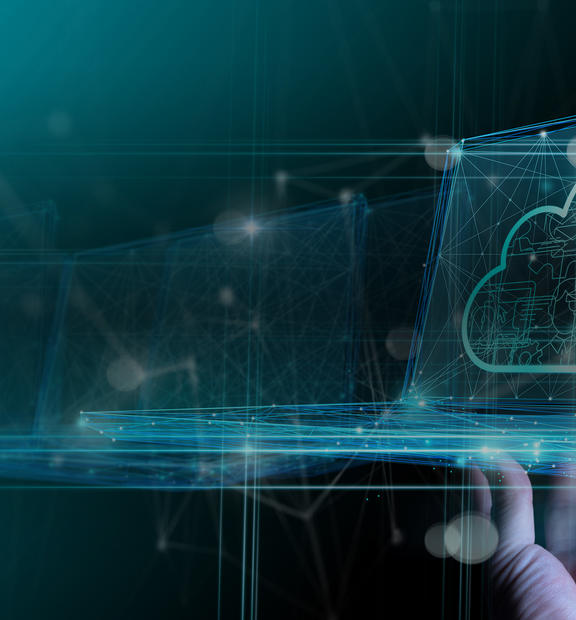 Hand holding abstract laptop with monitor focusing on cloud native capabilities
