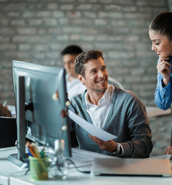 Working contact center team discussing reports