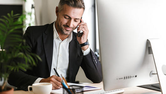 Business manager at his desk