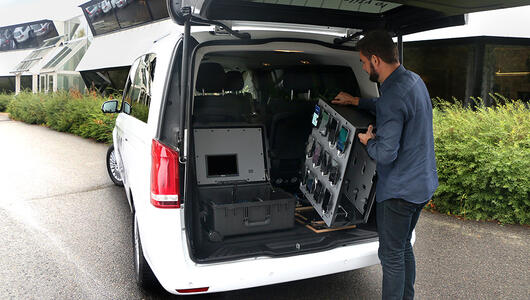 TEMS Paragon case and phone rack being installed in TEMS drive test van for benchmarking project
