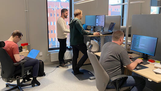 Research and development team collaborating in a modern office space, Skellefteå, Sweden