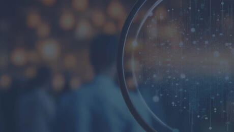 Close-up of magnifying glass, for focus on customer experience and seamless 5G monetization