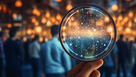 Close-up of magnifying glass, for focus on customer experience and seamless 5G monetization