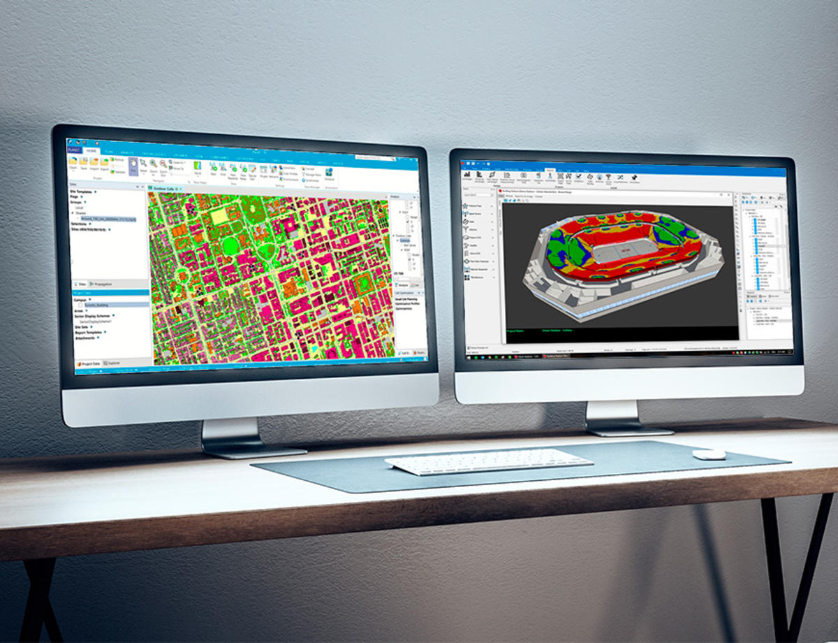 Two desk monitors with Planet screen captures