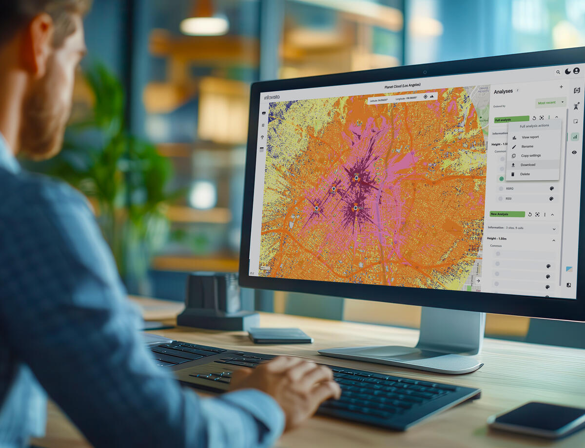 Man viewing a Planet Cloud dashboard - a SaaS-based RF planning platform built for speed, simplicity, and scalability