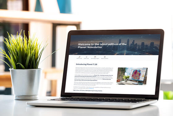 Laptop in office showing Planet newsletter